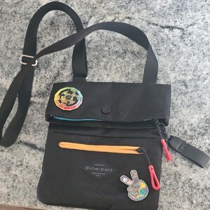 Sherpani Black Crossbody Bag with Colorful Accents